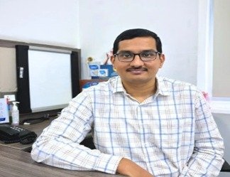 Dr. Pramod Adiga